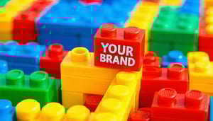 An assortment of coloured plastic building blocks.