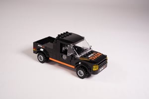 NovaBrix Mitre 10 Orange and black trade ute